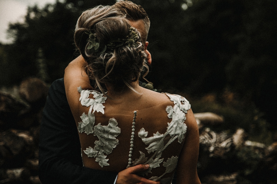 close up of couple kissing near the river at west mill venue